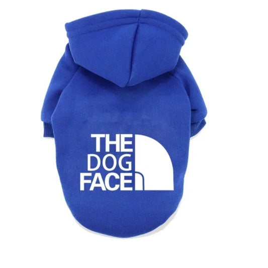 The Dog Face Hoodie in blue with a hood, designed for warmth and comfort for your furry friend.