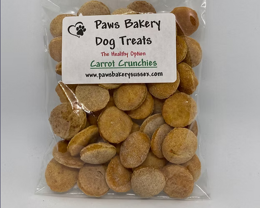 Bag of Paws Bakery Dog Treats labeled 'Carrot Crunchies' on a white background