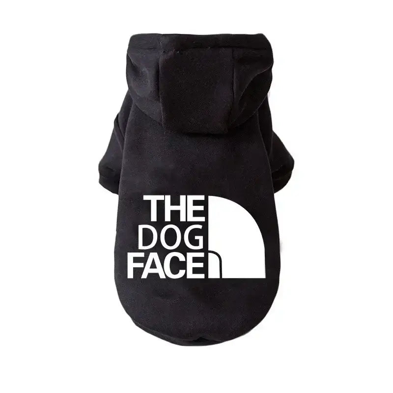 The Dog Face Hoodie features a warm black sweatshirt with a hood and logo for dogs.