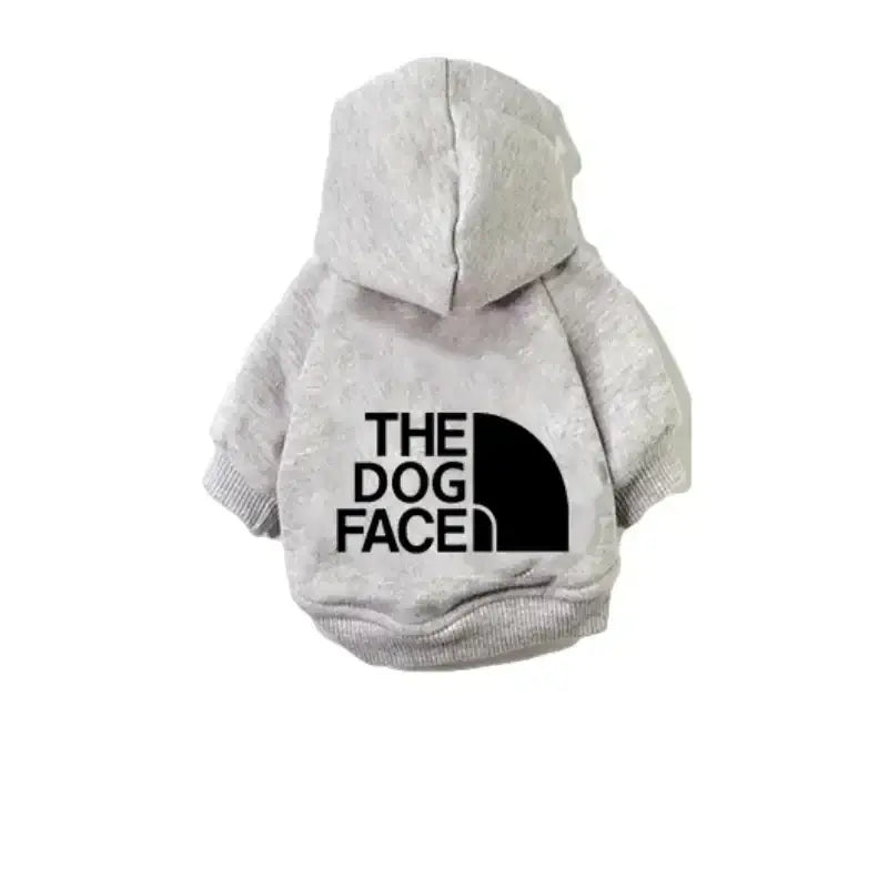 The Dog Face Hoodie – soft grey dog sweatshirt with hood and logo, perfect for chilly days.